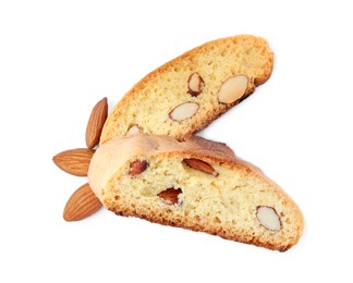 Slices of tasty cantucci and nuts on white background, top view. Traditional Italian almond biscuits
