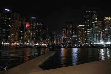 DUBAI, UNITED ARAB EMIRATES - NOVEMBER 03, 2018: Night cityscape of marina district with illuminated buildings
