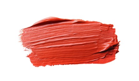 Photo of Sample of red paint on white background, top view
