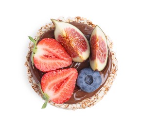 Tasty crispbreads with chocolate, berries and figs on white background, top view