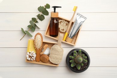 Flat lay composition with eco friendly products on white wooden table