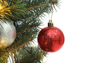 Christmas tree with beautiful baubles on white background, closeup