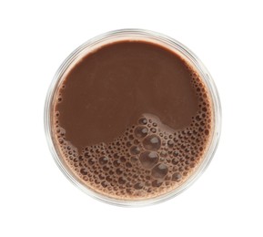 Delicious chocolate milk in glass isolated on white, top view