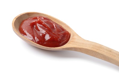 Ketchup in wooden spoon isolated on white, closeup