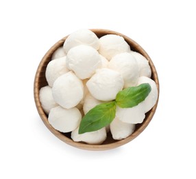 Wooden bowl with mozzarella cheese balls and basil on white background, top view