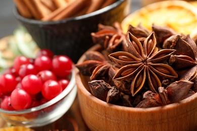 Dry anise stars in bowl, closeup. Mulled wine ingredient