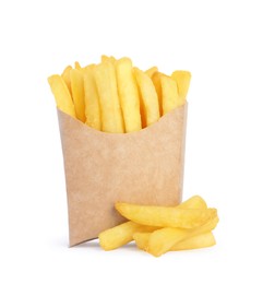 Paper takeout container with delicious french fries on white background