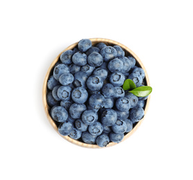 Fresh ripe blueberries in wooden bowl on white background, top view