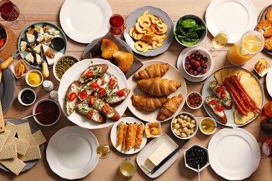 Brunch table setting with different delicious food, flat lay