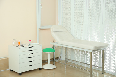 Modern interior of doctor's office with couch