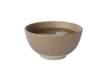 Bowl full of water on white background