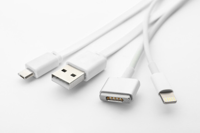 Charge cables on white background. Modern technology