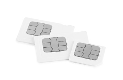 Mini and micro SIM cards on white background