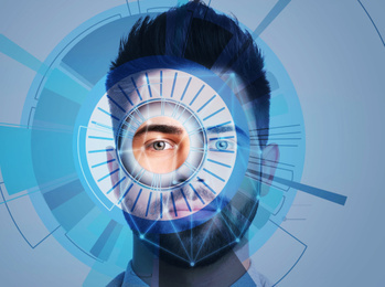 Image of Facial recognition system. Young man scanned by iris and digital biometric grid