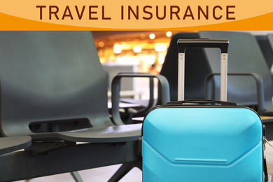 Blue suitcase near bench in airport. Travel insurance