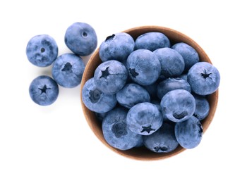 Bowl with tasty fresh ripe blueberries on white background, top view