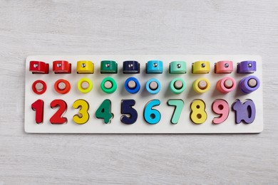 Photo of Math game Fishing for Numbers on white wooden table, top view
