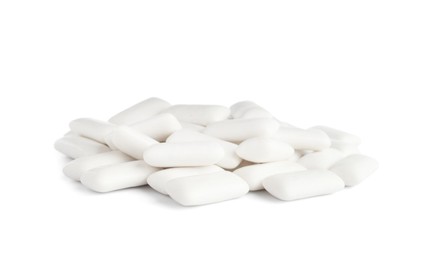 Heap of chewing gum pieces on white background