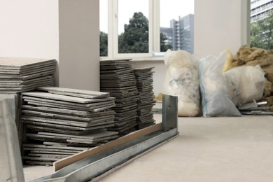 Building materials in room prepared for renovation