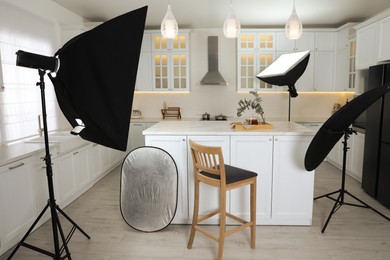 Professional photo studio equipment prepared for shooting kitchen interior