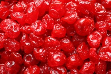 Tasty cherries as background, top view. Dried fruits as healthy food