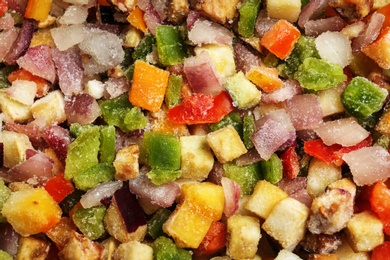 Photo of Frozen vegetable mix as background, closeup view