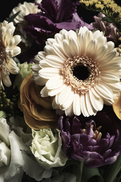 Beautiful fresh flowers as background, closeup. Floral card design with dark vintage effect