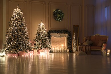 Photo of Festive room interior with beautiful Christmas trees