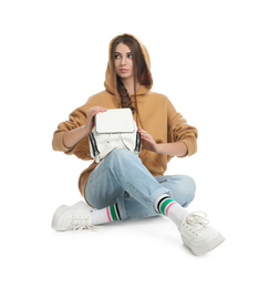 Photo of Beautiful young woman in casual outfit with stylish bag on white background