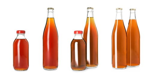 Image of Set with bottles of delicious kvass on white background