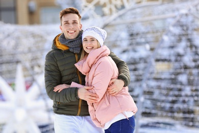 Photo of Portrait of happy couple outdoors on winter day