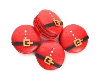 Beautifully decorated Christmas macarons on white background, top view