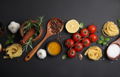 Flat lay composition with cooking utensils and fresh ingredients on black background