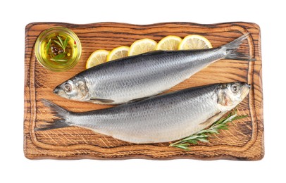 Photo of Wooden board with salted herrings, slices of lemon, oil and rosemary isolated on white, top view