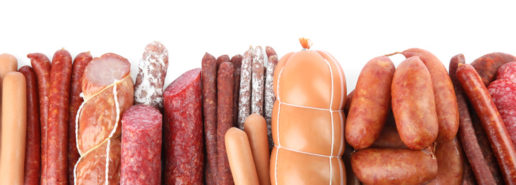 Different tasty sausages on white background, top view. Meat product