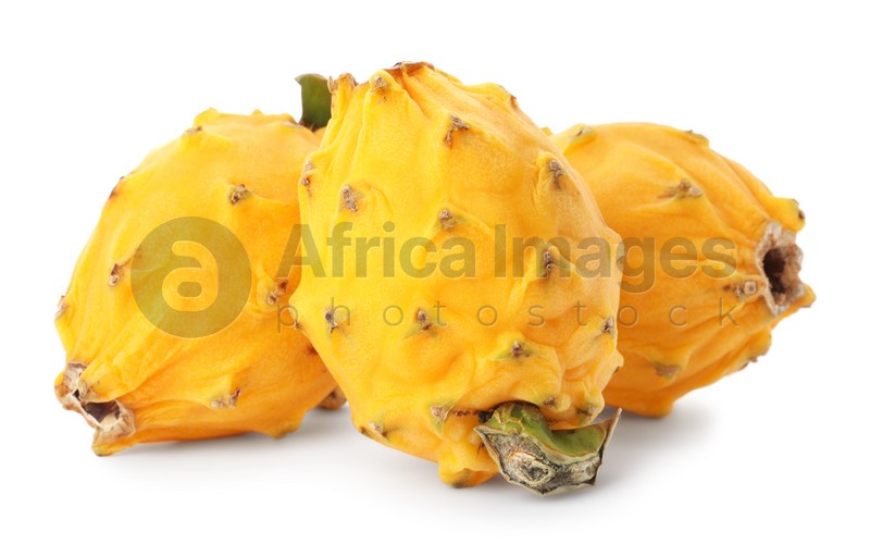 Photo of Delicious yellow dragon fruits (pitahaya) on white background