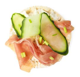 Puffed rice cake with prosciutto and cucumber isolated on white, top view