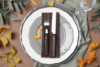 Beautiful autumn place setting and decor for festive dinner on table, flat lay