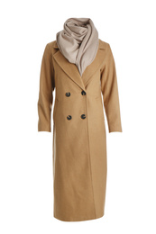Elegant brown coat and scarf on mannequin against white background. Women's clothes
