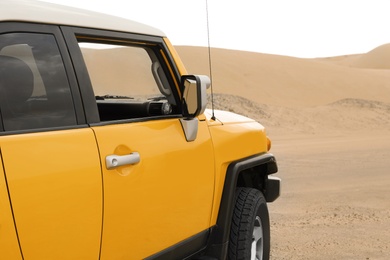 Modern car in desert ready for dune bashing