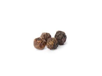 Photo of Black peppercorns isolated on white. Aromatic spice