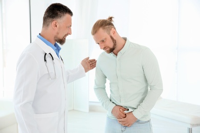 Man with health problems visiting urologist at hospital