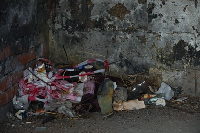 Garbage dump inside of old abandoned building