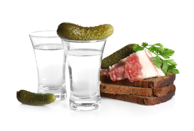 Russian vodka and different appetizers isolated on white