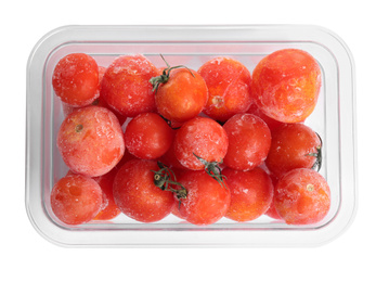 Frozen tomatoes in plastic container isolated on white, top view. Vegetable preservation