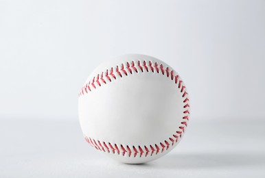 Photo of Baseball ball on white background, closeup. Sports game