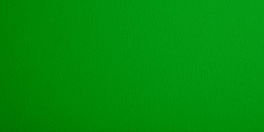 Image of Textured bright green background. Chroma key compositing