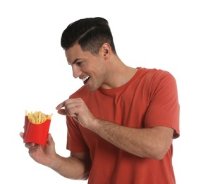 Man with French fries on white background
