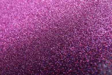 Closeup view of sparkling violet glitter background