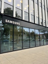 Photo of WARSAW, POLAND - JULY 13, 2022: Official Samsung store on city street